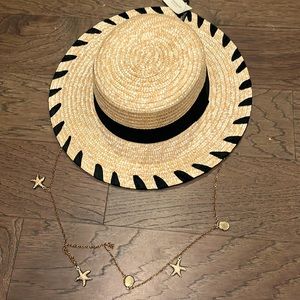 Awesome vacay straw and black ribbon hat with gold charm chain